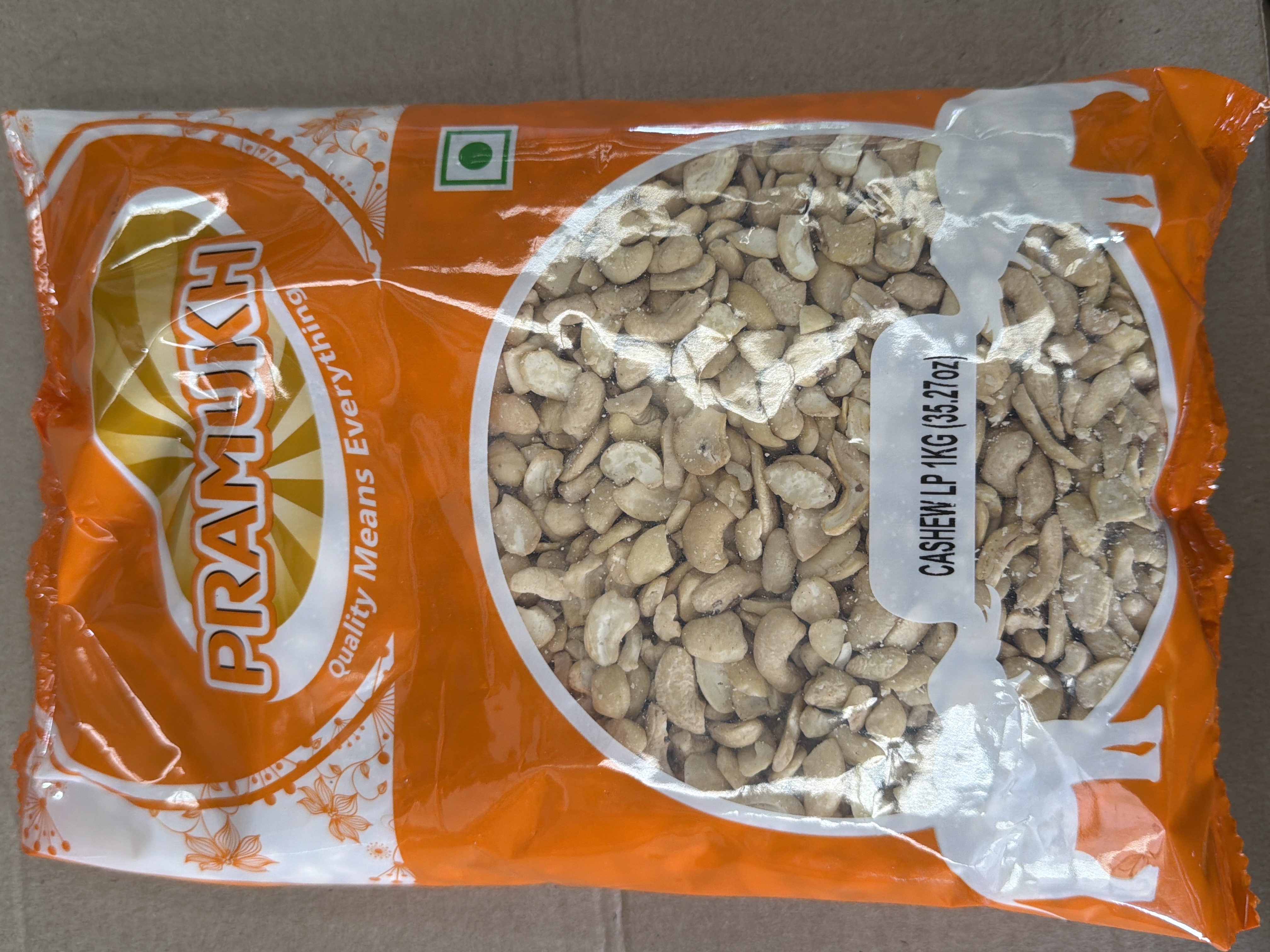 CASHEW PIECES ( L P) 1KG PRAMUKH